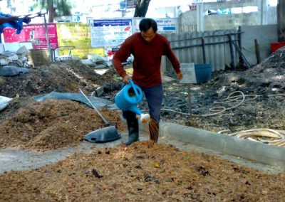 Officers are watering the fermented material.