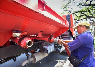 Plant-watering truck pumps water from the pool.